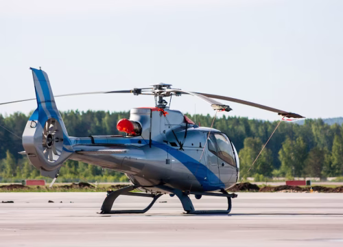 single-engine-light-helicopter-airport-apron_527900-273